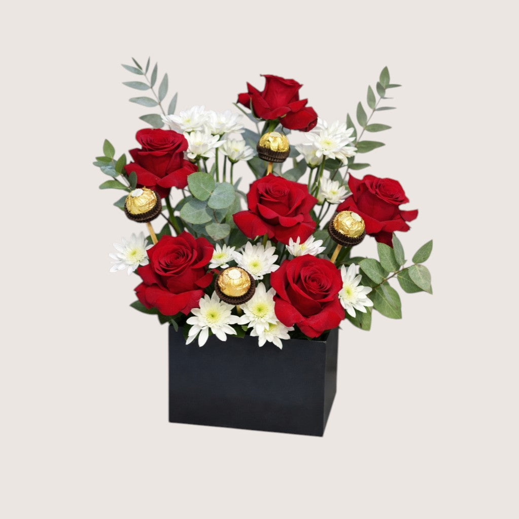 Black Box with Red Roses, Chocolate & Green Leaves