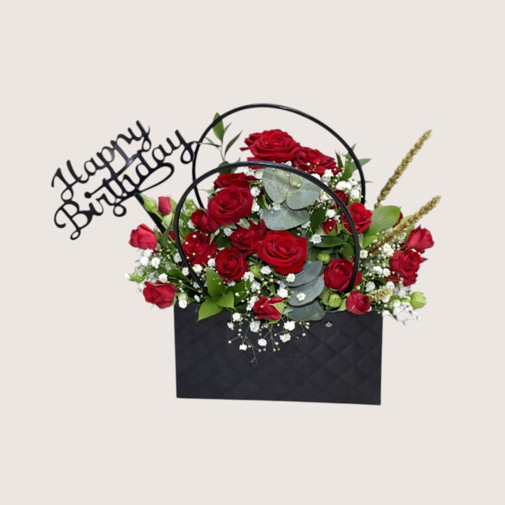 Birthday Bag Arrangement – Red Baby Roses, Gypsophila & Greens
