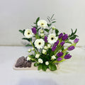 purple flowers wooden stand